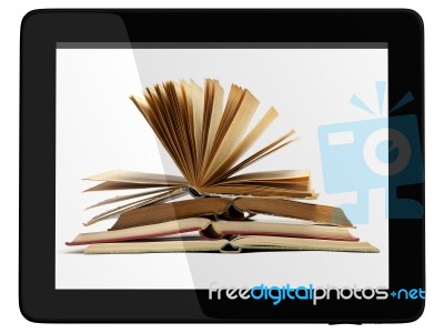 Tablet Computer And Book Stock Image