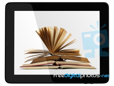 Tablet Computer And Book Stock Image