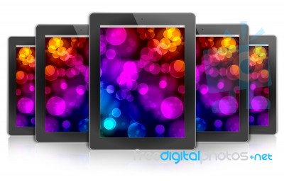 tablet PC with bokeh background Stock Image