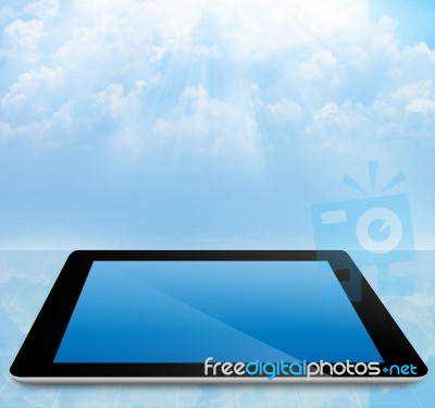 Tablet Pc With Cloudy Sky Stock Image