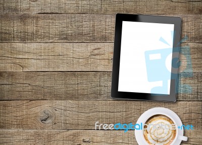 Tablet White Screen Display And Coffee On Old Wood Background Stock Photo