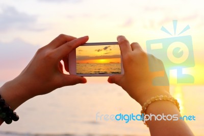 Take A Photo On The Beach Stock Photo