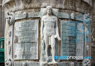 Tall Column And Statue Outside St Georges Chuch In Nordlingen Stock Photo