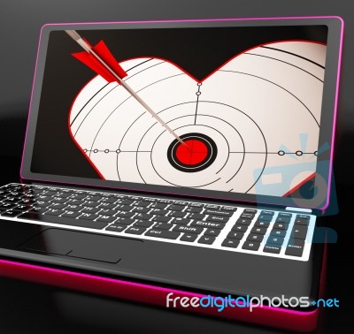 Target Heart On Laptop Shows Flirting Stock Image