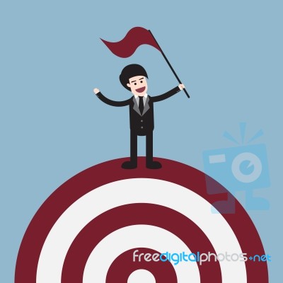 Target With Businessman Holding Flag On Top Stock Image