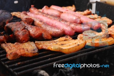 Tasty Meal With Fresh Meat On Grill Stock Photo