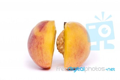 Tasty Peach Sliced On Half On White Stock Photo