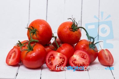 Tasty Pile Of Wet Tomatoes Stock Photo