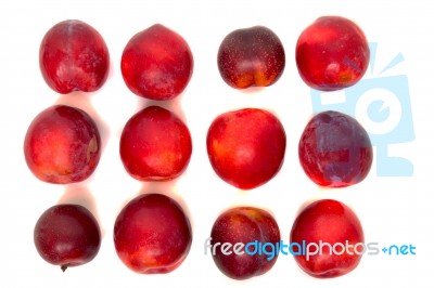 Tasty Red Plum Fruits Isolated On White Background Stock Photo