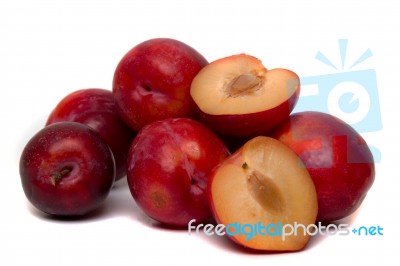 Tasty Red Plum Fruits Isolated On White Background Stock Photo