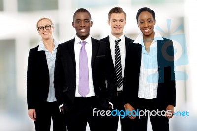 Team Of Corporate Associates Posing Stock Photo