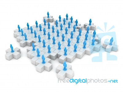 Team Standing On Jigsaw Stock Image