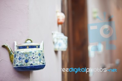 Teapot Embedded Into Facades Stock Photo