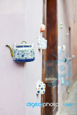 Teapot Embedded Into Facades Stock Photo