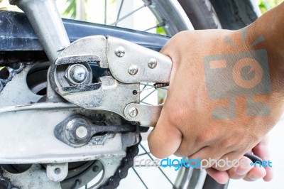 Technician Repairing Motorcycles Stock Photo