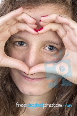 Teen With Hands In Heart Shape Stock Photo