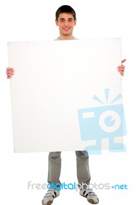 Teenage Boy Holding Blank Board Stock Photo