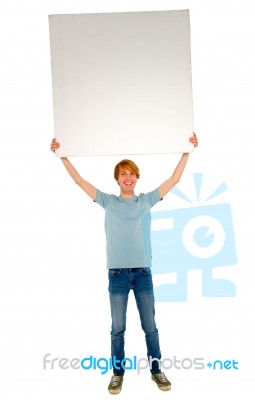 Teenage Boy Showing Blank Board Stock Photo