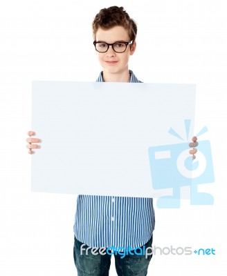 teenage Boy Showing Empty board Stock Photo