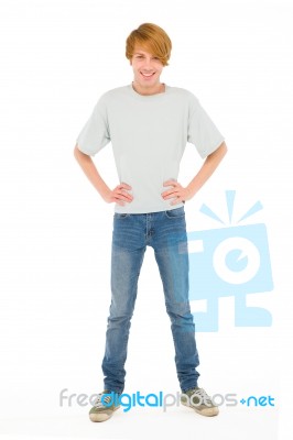 Teenage Boy standing with akimbo Stock Photo