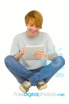 Teenage Boy Using Ipad Stock Photo