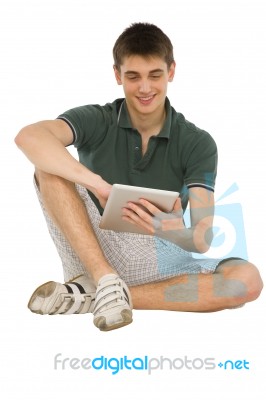 Teenage Boy Using Ipad Stock Photo