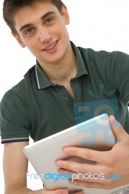 Teenage Boy Using Ipad Stock Photo