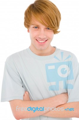 Teenage Boy With Arms Crossed Stock Photo