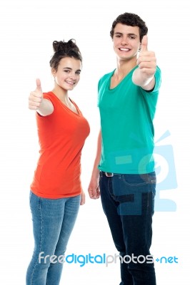 Teenage Couples Showing Thumbs Up Stock Photo