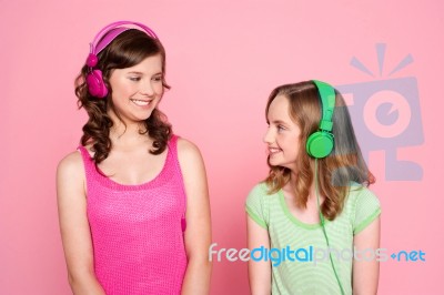 Teenage Friends Enjoying Music Stock Photo