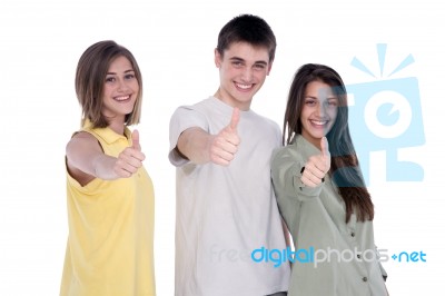 Teenage Friends Showing Thumbs Up Stock Photo