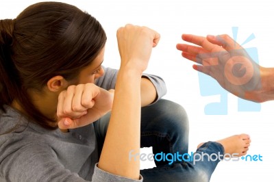 Teenage Girl Hand To Block Violence Stock Photo