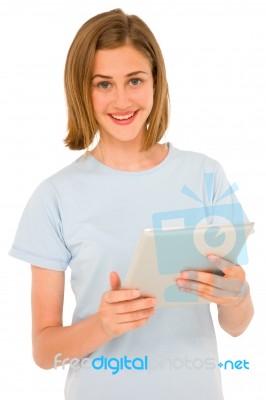 Teenage Girl holding Tablet pc Stock Photo