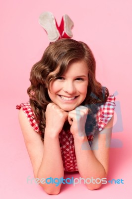 Teenage Girl Lying On Floor Stock Photo