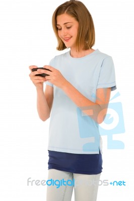 Teenage Girl Reading Sms Stock Photo