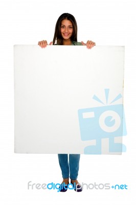 Teenage Girl Showing Blank Board Stock Photo