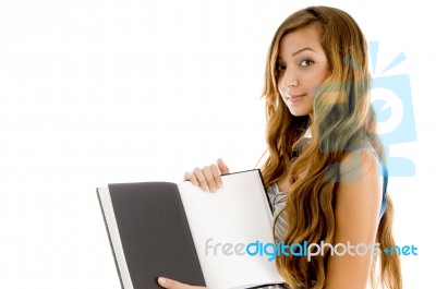 Teenage Girl Showing Notebook Stock Photo