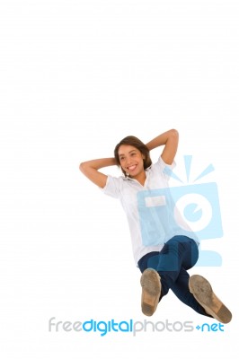 Teenage Girl Sitting On Floor Stock Photo