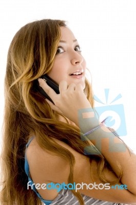 Teenage Girl Talking Over Mobile Stock Photo