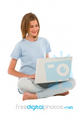 Teenage Girl Using Laptop Stock Photo