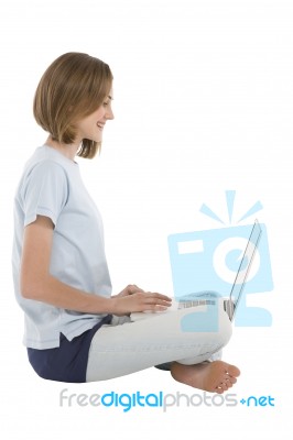 Teenage Girl Using Laptop Stock Photo