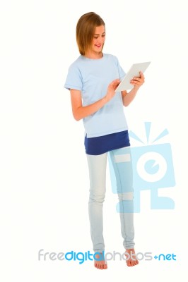 Teenage Girl Using Tablet pc Stock Photo