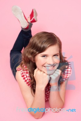 Teenage Girl With Hands On Chin Stock Photo