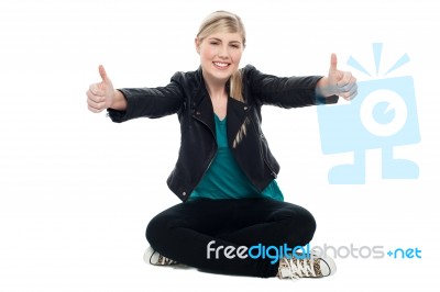 Teenage Model Showing Double Thumbs Up Stock Photo