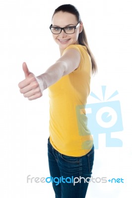 Teenager Gesturing Thumbs-up Stock Photo