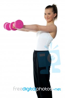 Teenager Holding Dumbbells Stock Photo