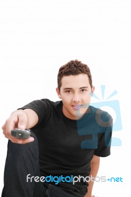 Teenager With TV Remote Control Stock Photo