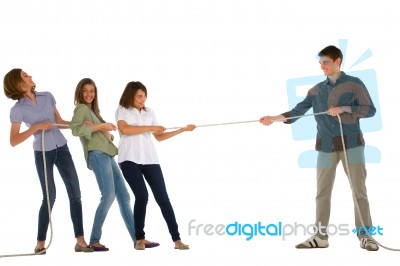 Teenagers Playing Tug Of War Stock Photo