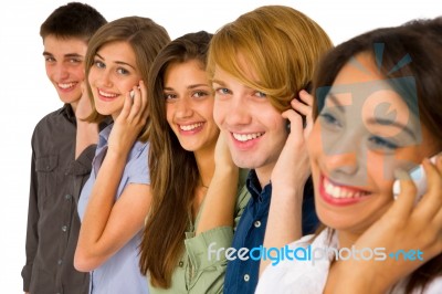 Teenagers Talking Over Phone Stock Photo