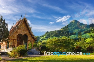 Temple In Thailand Near Mountain Valley During Sunrise Natural S… Stock Photo